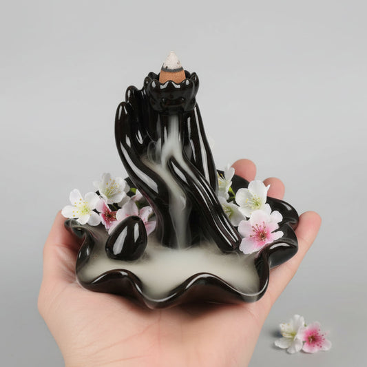 Atbulinio srauto smilkalinė - Lotoso žiedas rankoje