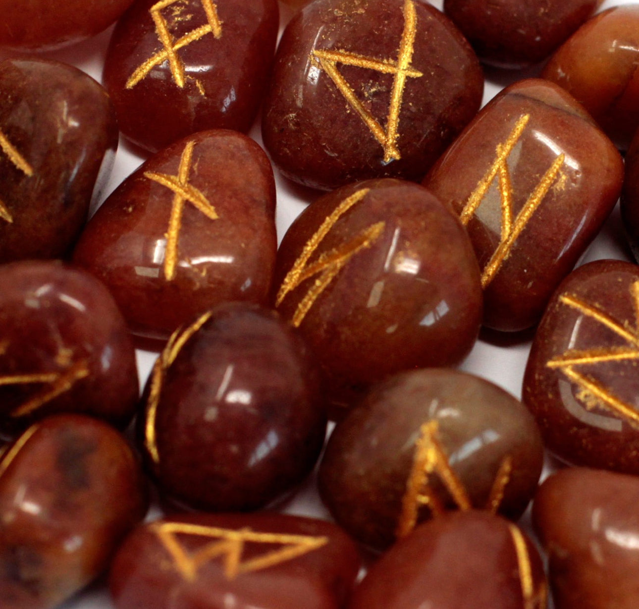 Runų akmenų rinkinys maišelyje - raudonasis aventurinas