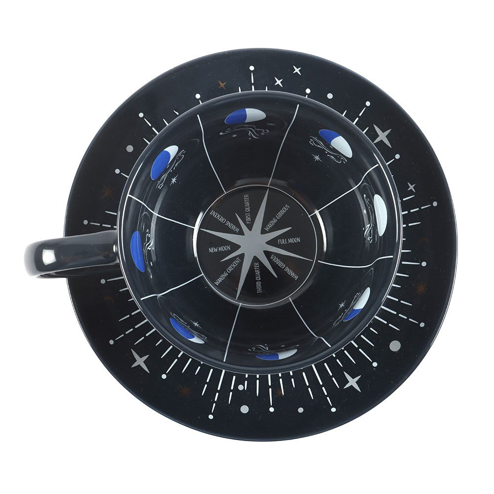 Mėlynojo mėnulio fazės arbatos puodelis ir lėkštutė